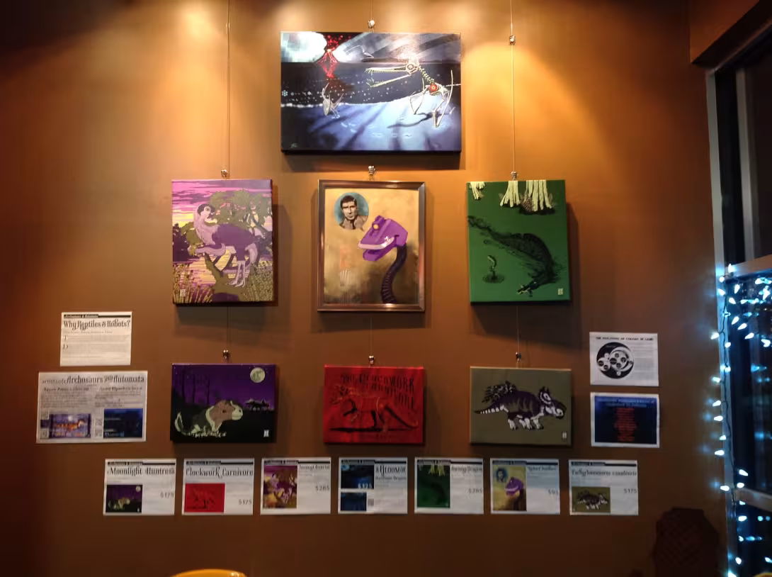 Wall filled with art by Raven and Scott.